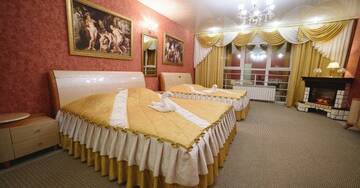 Номер VIP+ с 2 двуспальными кроватями в Гостинице Пантера